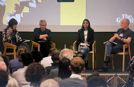 4 speakers on-stage during panel session for Manchester International Festival