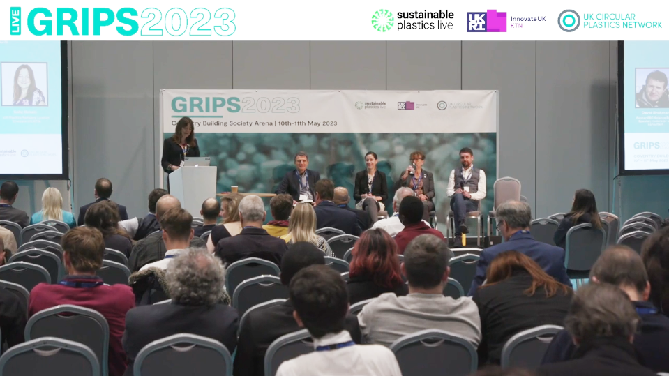 Panellists shown onstage at the GRIPS 2023 Conference during live stream
