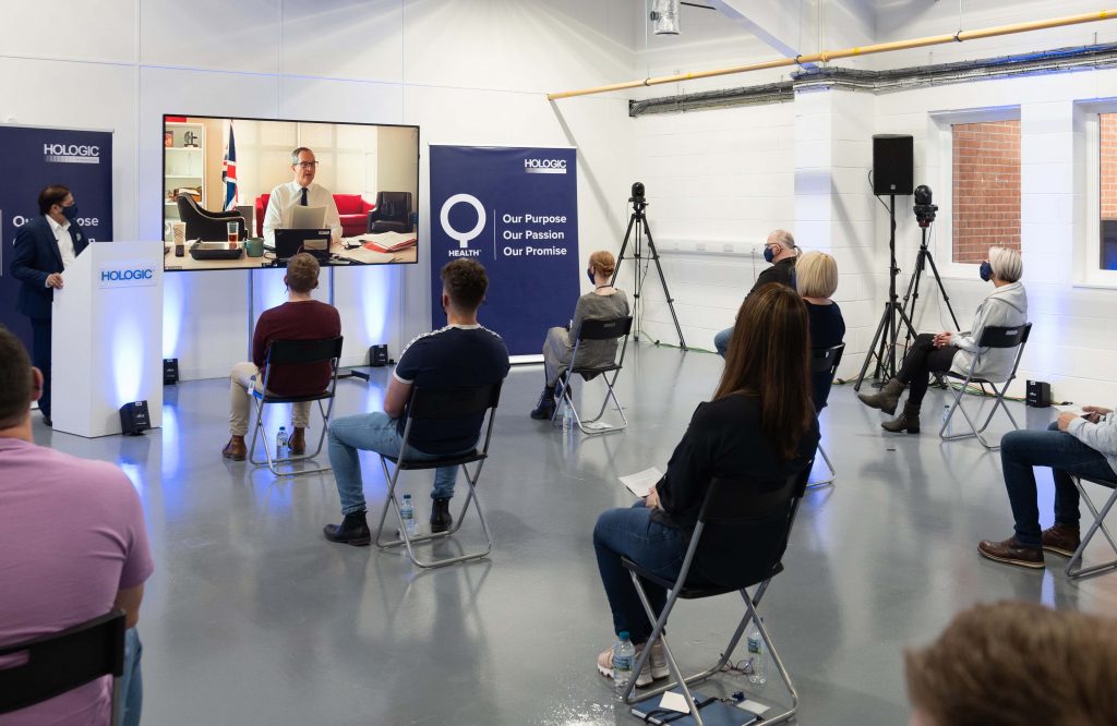 Minister for Health, Lord Bethell, addressing the Hologic staff via live video link during live stream