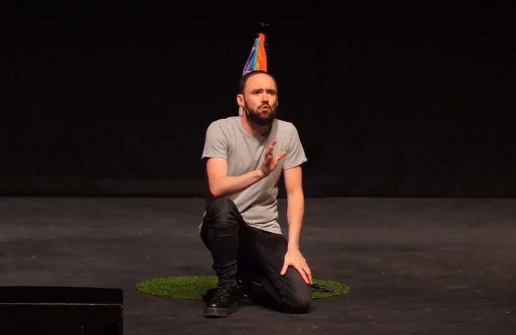 Actor performing on stage at the Lowry during production of 34